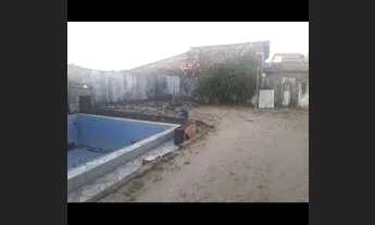 Imagem 2: Terreno com 5 casas para venda