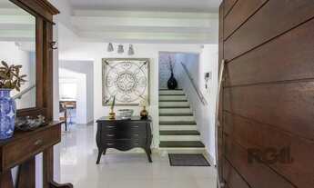 Imagem 7: Casa a venda no bairro Guarujá com 4 dormitórios, piscina e salão de festas