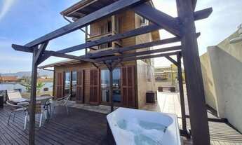 Imagem 5: Casa pé na areia na Praia do Campeche com 2 dormitórios