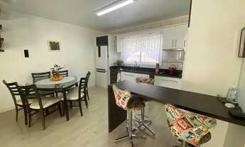 Imagem 5: Sobrado duplex com 3 dormitórios, cozinha, sala de estar, banheiro social, lavabo, área de