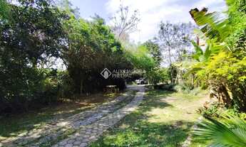 Imagem 5: ?? Pé na Areia! Terreno de 1.809 m² com 2 casas na Praia do Santinho - Florianópolis