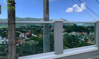 Imagem 2: Casa com 3 quartos, 110 m² - venda por R$ 830.000 ou aluguel por R$ 3.700/mês - Serra Gran