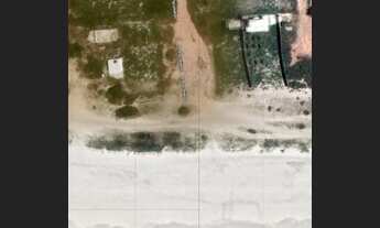 Imagem: Casa na beira do oceano