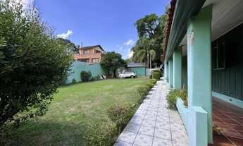 Imagem 4: Casa com amplo pátio e muito área verde