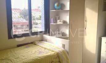 Imagem 5: Apartamento de frente com sacada e churrasqueira