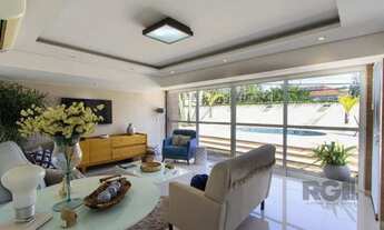 Imagem 2: Casa a venda no bairro Guarujá com 4 dormitórios, piscina e salão de festas