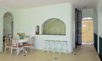 Imagem 7: Sobrado para venda tem 468 metros quadrados com 5 quartos em Jardim Virgínia - Guarujá - S