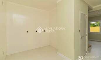 Imagem 3: Casa de condomínio para venda tem 102 metros quadrados com 3 quartos