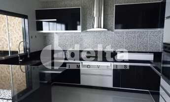 Imagem 7: Casa residencial com 3 suítes disponível para locação no bairro Alto Umuarama em Uberlândi