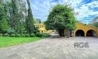 Imagem 4: Casa em Porto Alegre, no bairro Pedra Redonda, com 7 dormitório(s), e 7 banheiro