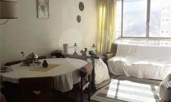 Imagem 2: Apartamento nos Jardins ensolarado em rua tranquila