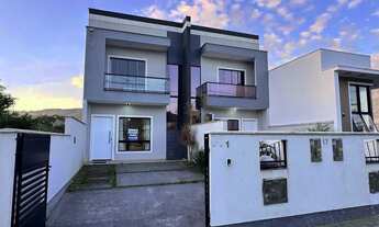 Imagem 4: Sobrado com 2 dormitorios sendo 2 suítes e 3 banheiros e área atras fechada no Lisboa 3 Fo