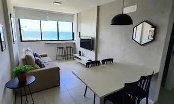 Imagem 2: Quarto e sala mobiliado vista pro mar