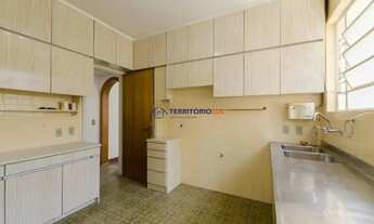 Imagem 7: Excelente residência térrea com 272m² de área privativa, com 4 domritórios e 6 vagas de ga