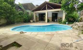 Imagem 3: Casa em Porto Alegre, no bairro Ipanema, com 6 dormitório(s), e 6 banheiros, par