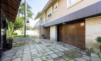 Imagem 5: Casa a venda no bairro Guarujá com 4 dormitórios, piscina e salão de festas