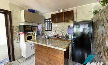 Imagem 5: Casa com piscina no centro de Imbé