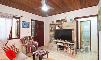 Imagem 6: Casa em Porto Alegre, no bairro Ipanema, com 2 dormitório(s), e 2 banheiros, à venda