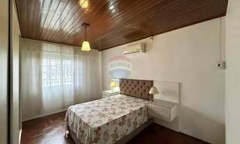 Imagem 7: Casa ampla com suíte, energia solar e pátio calçado