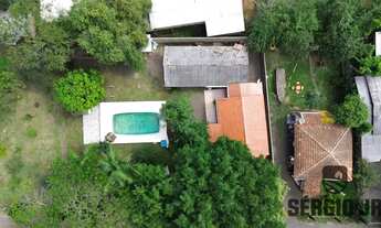 Imagem 2: Terreno com 990m², chalé, piscina e galpão em Triunfo