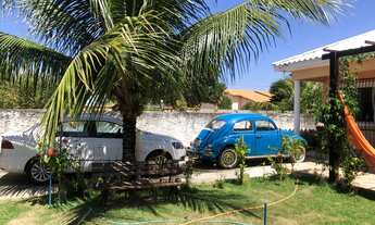 Imagem 5: Se encante com essa bela casa de três quartos em rua residencial !