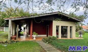 Imagem 4: Casa com 4 lotes à venda em Ubatuba. Praia da Maranduba. À 100 metros da Praia. Com escrit