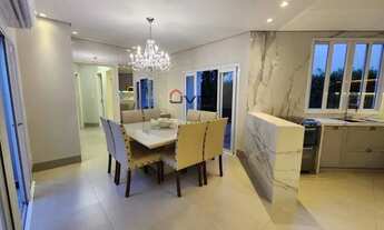 Imagem 5: Viva no luxo e no conforto nesta incrível casa de alto padrão! Com 3 quartos sendo um suít