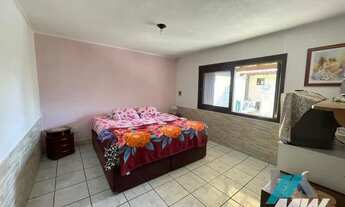 Imagem 6: Casa com piscina no centro de Imbé