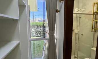 Imagem 15: Viva o Alto Padrão: Casa com 4 Suítes, Piscina e Energia Solar