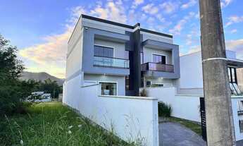 Imagem 3: Sobrado com 2 dormitorios sendo 2 suítes e 3 banheiros e área atras fechada no Lisboa 3 Fo