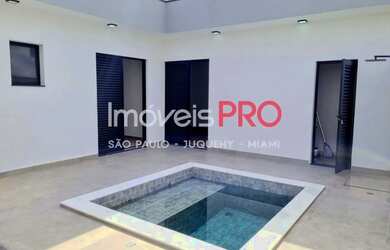 Imagem 2: Casa nova a venda em condominio em Indaiatuba com piscina, jardim, churrasqueira, 3 suites