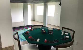 Imagem 2: Casa de condomínio para venda tem 600 metros quadrados com 5 quartos