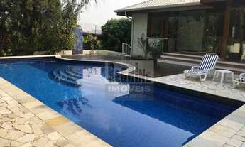 Imagem 2: Casa á venda no Alphaville Campinas com amplo terreno de 1.153m³ e 453m² construídos. 4 su