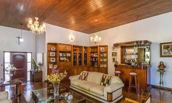 Imagem 6: Casa de condomínio para venda possui 400 metros quadrados com 5 quartos