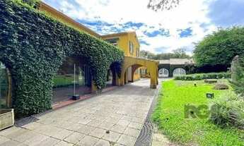 Imagem 2: Casa em Porto Alegre, no bairro Pedra Redonda, com 7 dormitório(s), e 7 banheiro