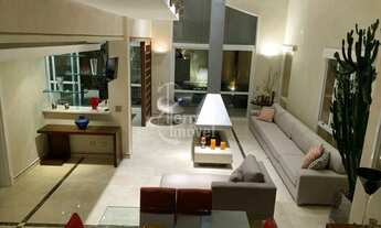 Imagem 2: Casa para venda mobiliada com 430m², 4 suítes, sala de TV, piscina, adega e paisagismo no