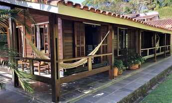 Imagem 2: Excelente Casa Térrea de Madeira CASEMA Condomínio Granja II - 3 suites, piscina, lareira