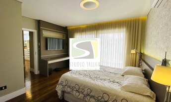 Imagem 7: Casa para aluguel e venda possui 378 metros quadrados com 4 suítes