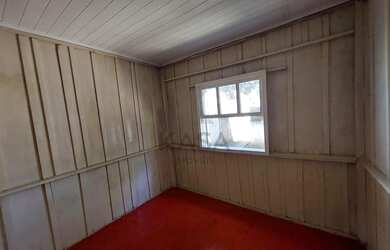 Imagem 6: Casa de 02 dormitórios ( fundos), sala de estar, cozinha, banheiro social e área de serviç