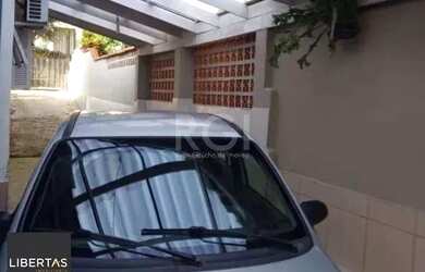 Imagem 6: Casa em Porto Alegre, no bairro Espírito Santo, com 3 dormitório(s), e 3 banheir