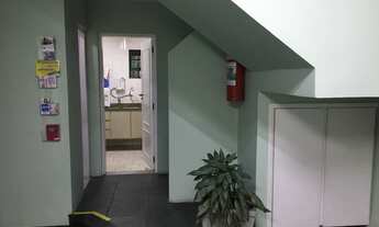 Imagem 7: Casa comercial no Centro de Guarulhos com 4 salas, recepção e estacionamento