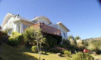 Imagem 3: Casa com 4 dormitórios à venda, 500 m² por R$ 2.700.000 - Vila Porã - Campos do Jordão/SP