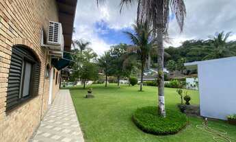 Imagem 4: Casa de condomínio térrea para venda possui 308 metros quadrados com 5 quartos