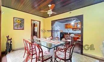 Imagem 5: Casa em Porto Alegre, no bairro Guarujá, com 5 dormitório(s), e 5 banheiros, à venda