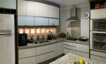 Imagem 6: Sobrado com área comercial e casa separadas para venda possui 3 quartos