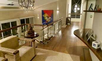 Imagem 7: Casa para venda mobiliada com 430m², 4 suítes, sala de TV, piscina, adega e paisagismo no