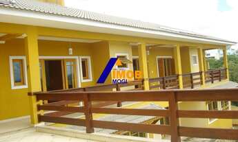 Imagem 6: Casa com lareira e quadra poli esportiva