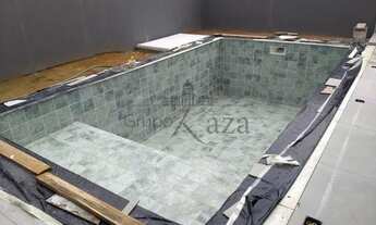 Imagem 2: Casa de condomínio para venda possui 235 metros quadrados com 3 quartos