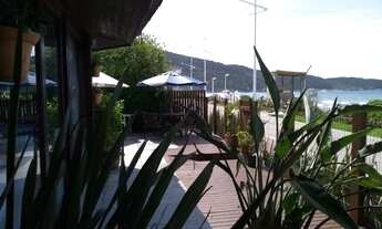 Imagem 7: Casa para aluguel com 120 metros quadrados com 3 quartos em Praia de Bombas - Bombinhas