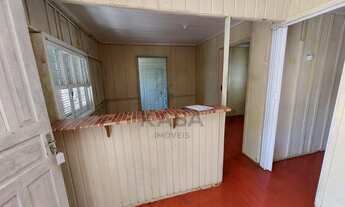 Imagem 2: Casa de 02 dormitórios ( fundos), sala de estar, cozinha, banheiro social e área de serviç